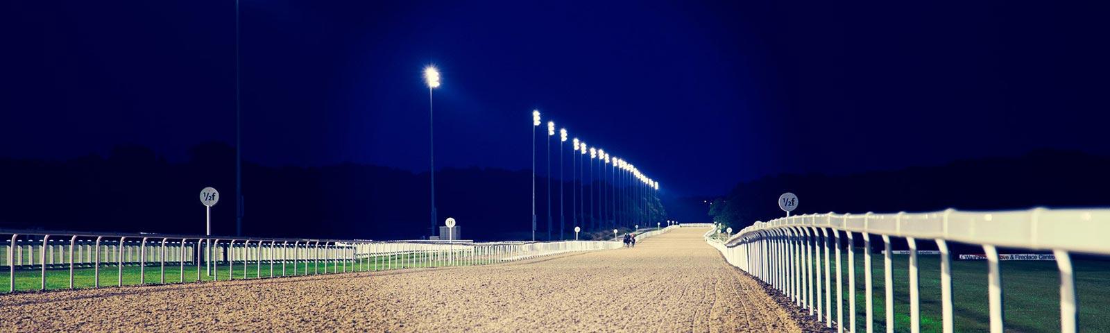View of a race track at night.