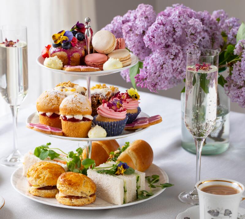 afternoon tea on a 3 tiered cake stand, champagne and tea cups