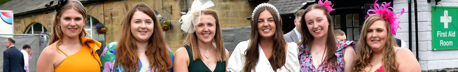 A hen do at Newcastle Races posing for a picture