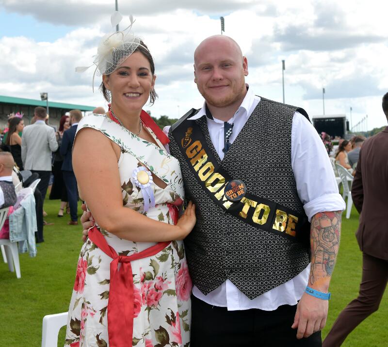 A bride to be, and a groom to be celebrating a joint hen and stag do at Newcastle Races.