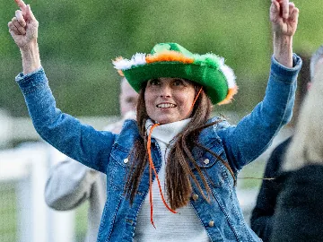 Woman wearing an Irish cowboy hat for St Patrick's Day